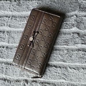 Gucci guccissima long leather brown Mayfair bow wallet